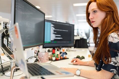 Woman researching what you can do with a master's in computer science